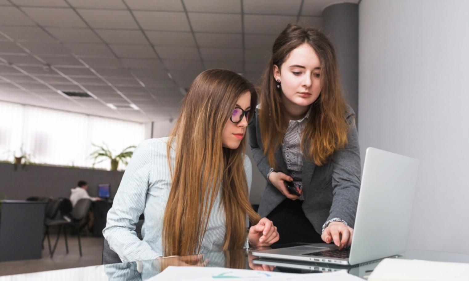 Business owners collaborating on cost reduction strategies