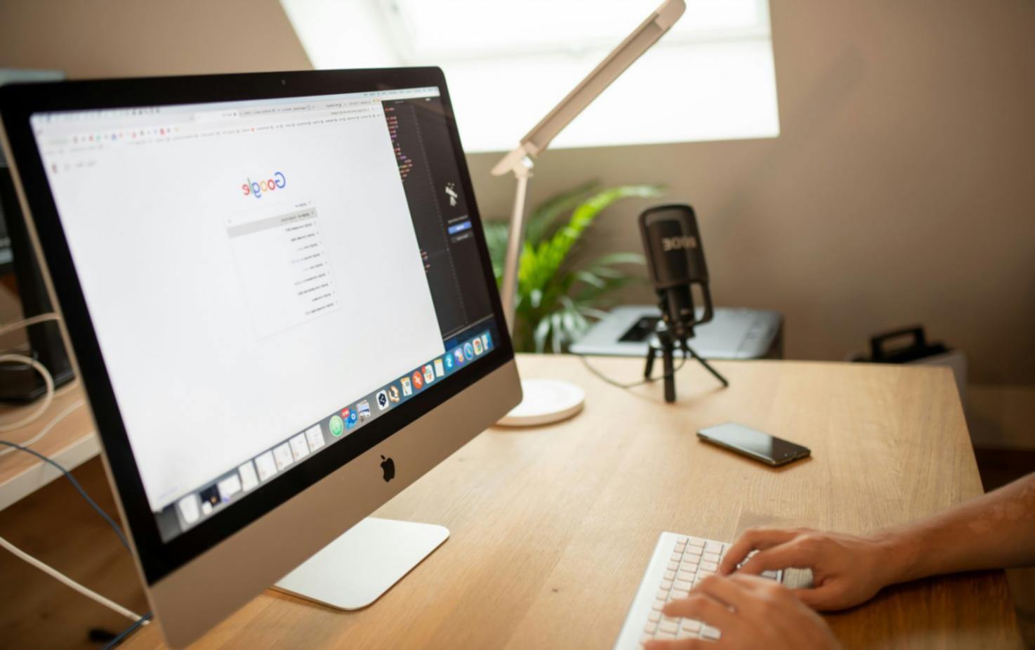 Financial planning workspace with organised documents and calculator